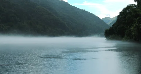 Fog overflowed the Xiaodong River Stock Footage 295584943
