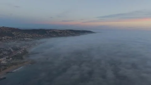 Fog Overtaking Coastline at Sunset 3 Stock-Footage 340579462
