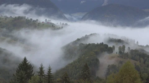 Fog passing over mountain peak, gorgeous nature landscape Video stock 141354899