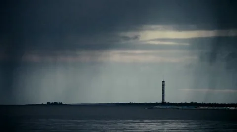 Fog rambles over sea with lighthouse Stock Footage 67171361