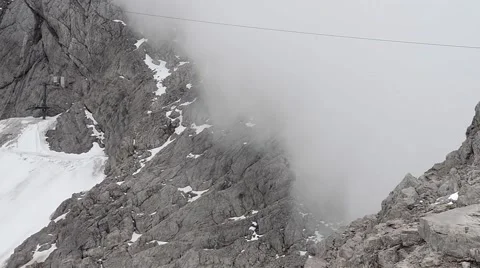 Fog rises between mountain rocks Stock Footage 42142835