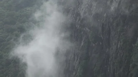 Fog rising through the mountain 스톡 동영상 149123880