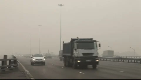 Fog on road Stock Footage 6875346