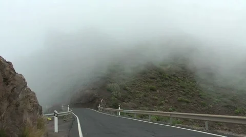 Fog on a road in the mountains Stock Footage 41308854