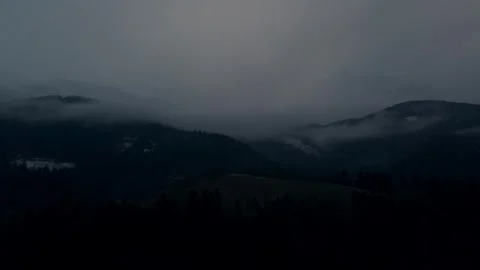 Fog rolling across distant mountains Stock Footage 328338080