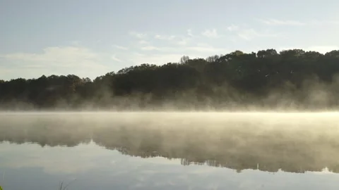 Fog rolling across Lake Stock Footage 264220516