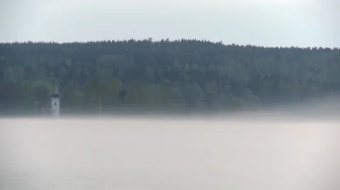 Fog rolling on front of lighthouse Stock Footage 2257615