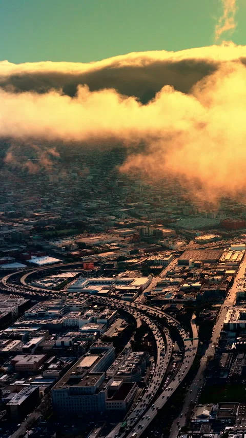 Fog rolling over city freeway interchange, San Francisco, California Vertical Stock Footage 342274813