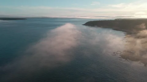 Fog rolling in over the ocean Video stock 248195451