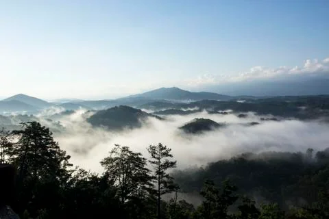 Fog Rolling through Mountains Stock Photos