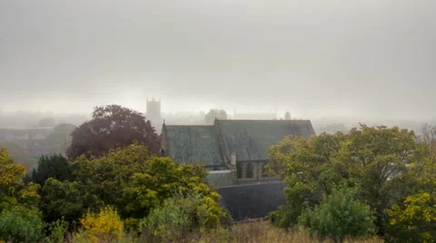 Fog Rolling Through Town Timelapse Video stock 56650754