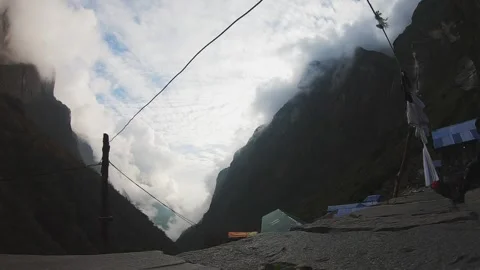 Fog in the sky timelapse in a valley 4k Stock Footage 249304026
