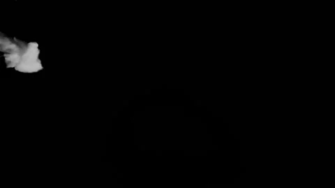 Fog slowly drifts across frame on a black background Stock Footage 95640341