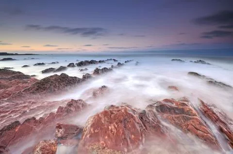 Fog spread like a river on the mountainside Stock Photos