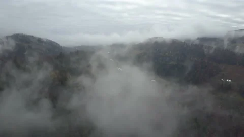 Fog under the mountains, mountain tops, clouds, alps 4k Stock Footage 149509369