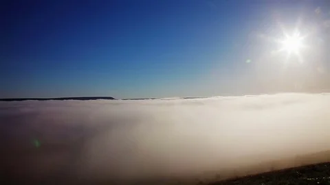 Fog in the valley between the hills Stock Footage 79403039