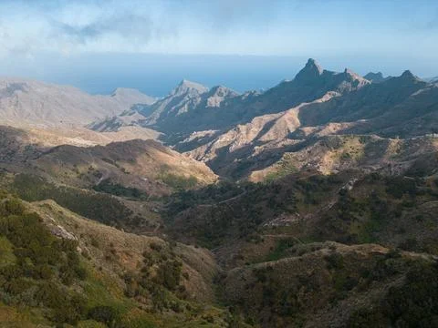 Fog with wind and misty cloud in green mountains, Anaga park, Tenerife, Canary Stock Photos