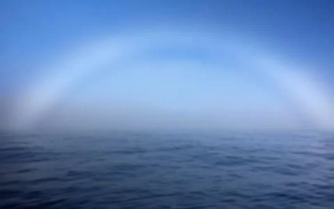A fogbow over Arctic Ocean Stock Photos