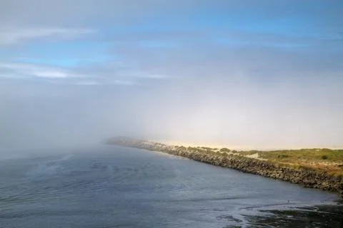 Foggy breaker Stock Photos