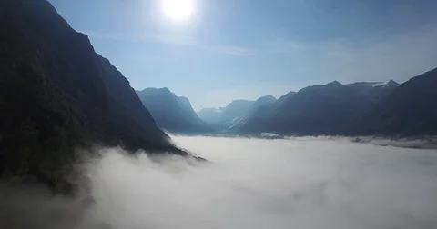 Foggy Clouds Between Mountains 3 Stock Footage 82269712