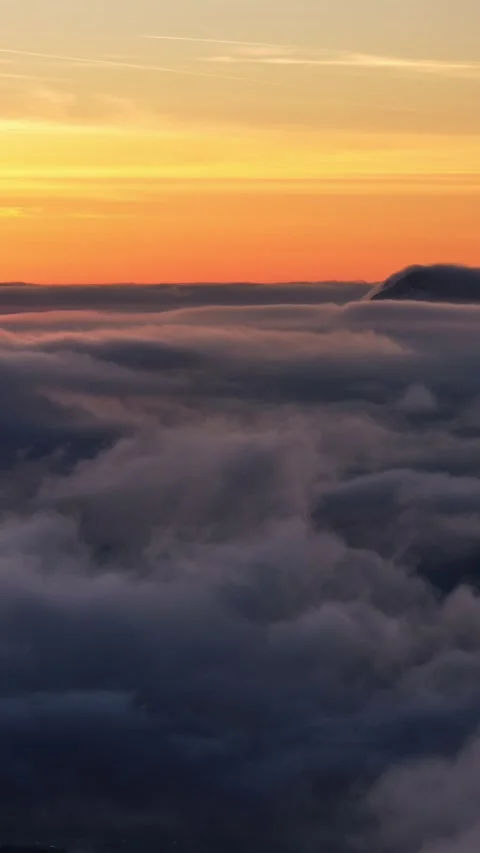 Foggy Clouds Flow Like an Ocean over Morning Mountain, Vertical Nature Time Stock Footage 321751657