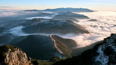 Foggy Clouds Flows Like a sea in Misty Mountains Nature Stock Footage 293776842