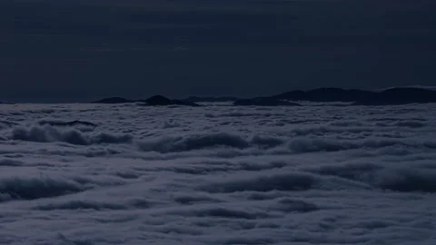Foggy clouds motion in mountain valley in dark moonlight night Time lapse Stock Footage 162662505