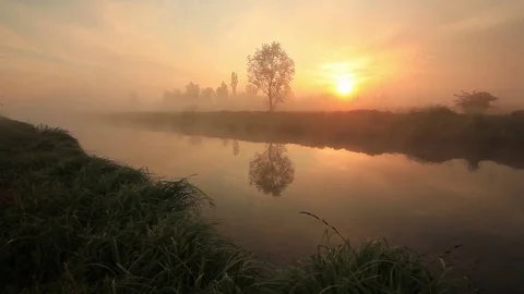 Foggy dawn over a beautiful spring river Stock Footage 78149859