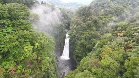 Foggy Forest Gorge &amp; Akiu Waterfall | Japan - 4K Aerial Video Stock Footage 329052344