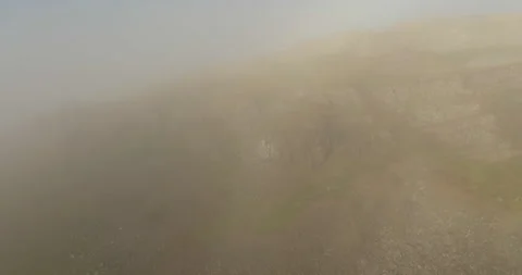Up the foggy hills Stock Footage 296673033