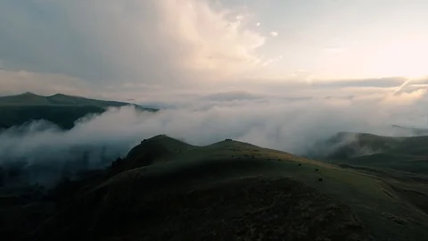 Foggy hills on sunset Stock Footage