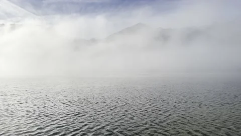 Foggy Lake Clouds go by Stock Footage 239105278