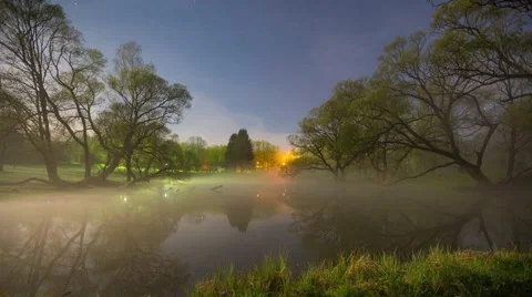 Foggy lake under moonlight Stock Footage 56903316
