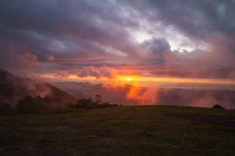 Foggy landscape dramatic sky cloud the morning beautiful sunrise mist cover m Stock Photos