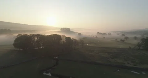 Foggy meadows at sunrise Stock Footage 156290846