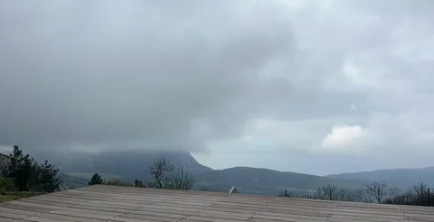 Foggy mountain landscape with low clouds and calm atmosphere Stock Footage 334062083