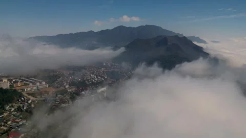 Foggy Mountain Panorama. Dramatic Fog Town With Mysterious Mountain Shadows Stock-Footage 338359855