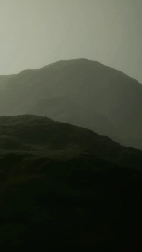Foggy mountains during twilight in a remote landscape scene Stock Footage 334264513