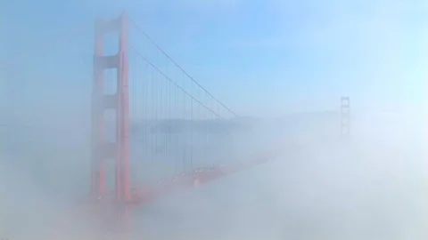 Foggy overview of the  Golden Gate Bridge in San Francisco’s, California USA Stock Footage 101855506