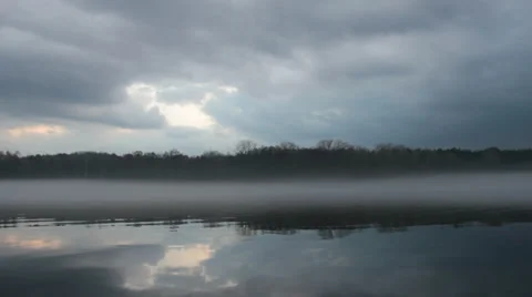 Foggy river with dramatic sky in the evening (FULL HD) Stock-Footage 36936769