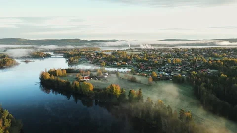 Foggy river with an industrial section in the background Stock Footage 253344879