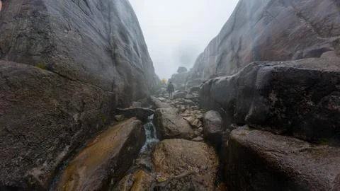 Foggy Rocky Path Through Cliffs Stock Photos