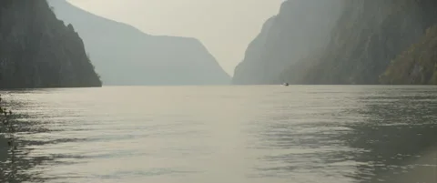 Foggy scenery with wavy waters in Danube river canyon 4K scope video Stock Footage 324625941