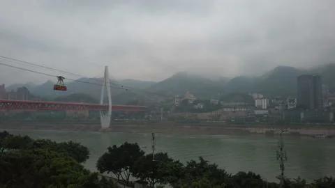 Foggy Skyline With Cable Car Over Yangtze River,Chongqing,China Stock Footage 153294204