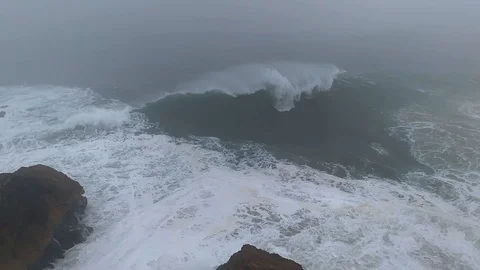 Foggy  SloMo Breaking Waves Stock Footage 107626483