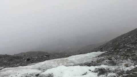 Foggy summer day in the mountains at the foot of the glacier Stock Footage 173429341