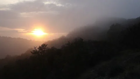 Foggy sunset hill Stock Footage 148552257