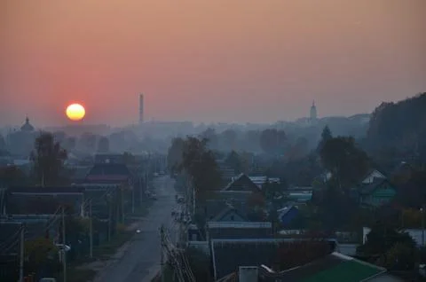 Foggy sunset Stock Photos