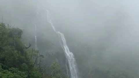 Foggy waterfall during the day Stock Footage 270486566