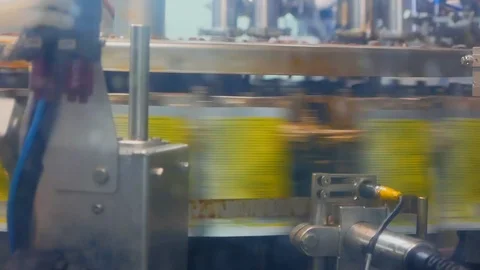 Foil is getting put onto boxes relocated by the transporter. Packing process at Видео 129091158